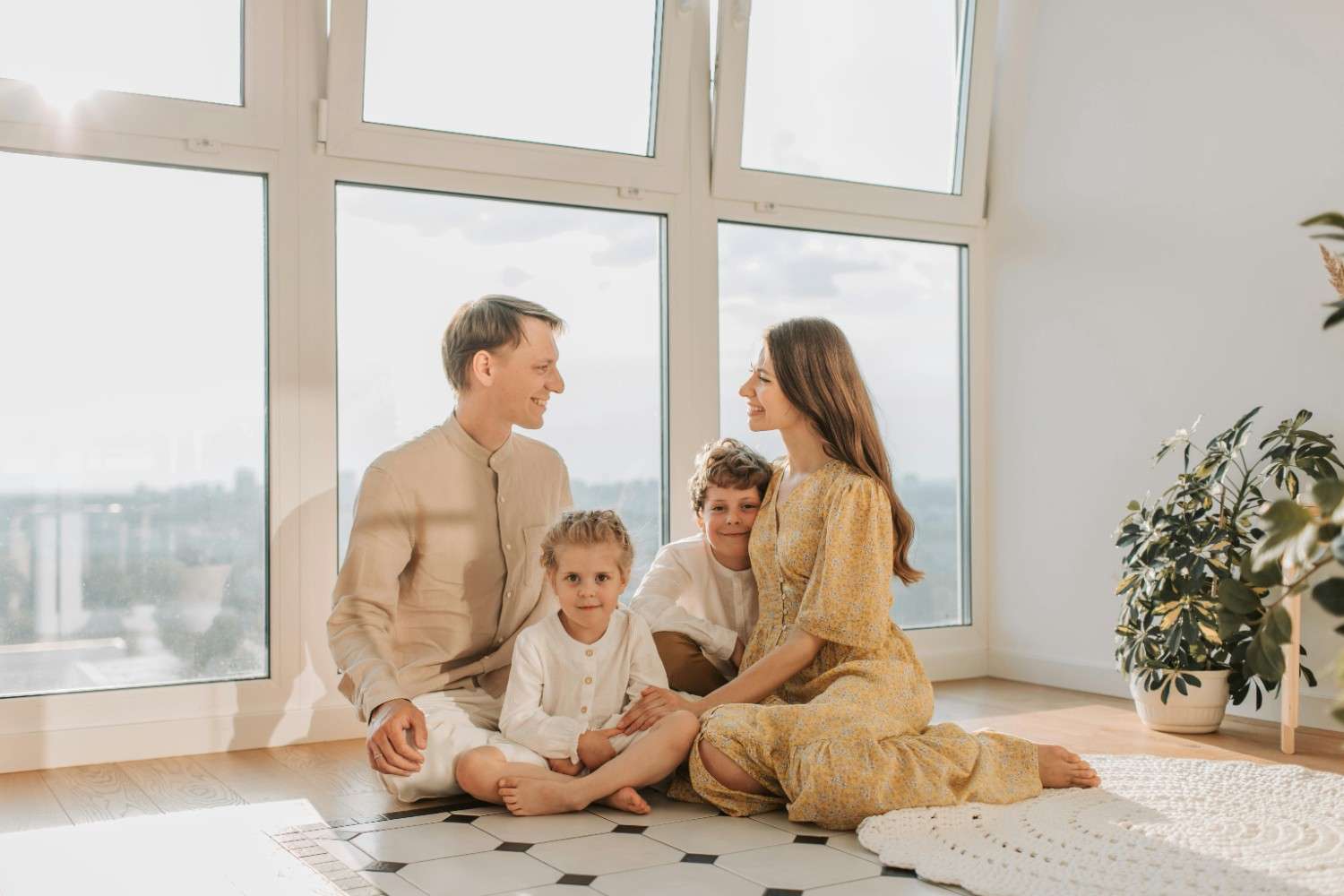 Happy family protected by quality home insurance
